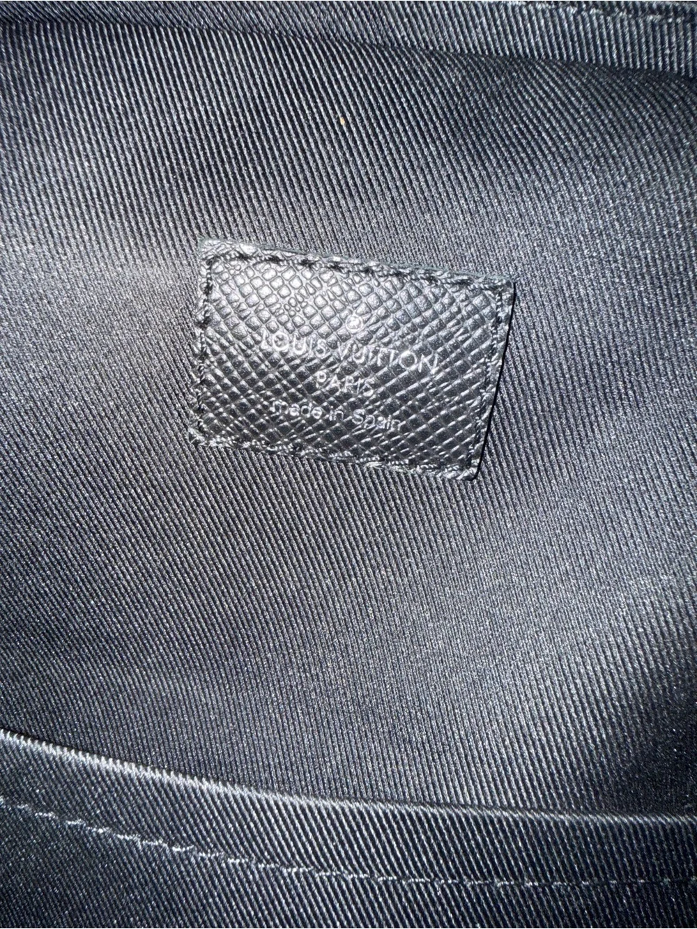 Louis Vuitton Black Leather Sling Belt Bag with Silver LV Emblem